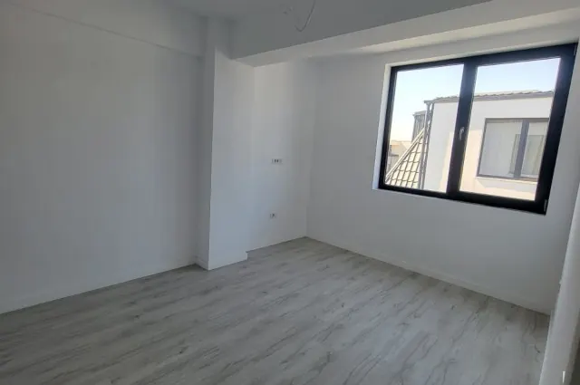 Apartament 3 camere de vânzare – Otopeni, Str. I.C. Brătianu | Parcare inclusă, fotografia 3
